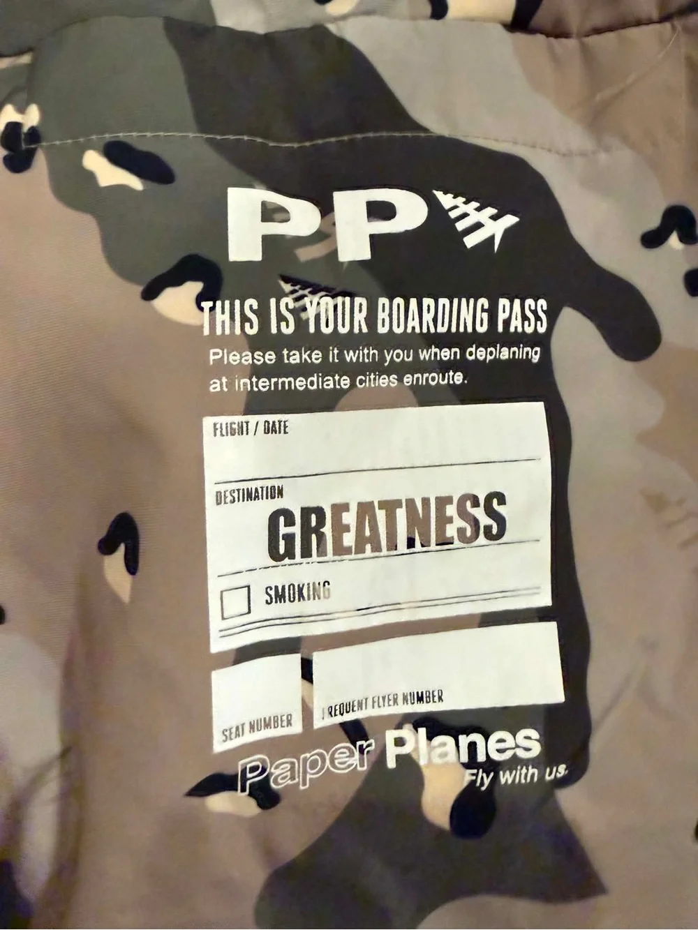 Paper Planes multi-pocket cargo pants featuring an all-over camouflage print